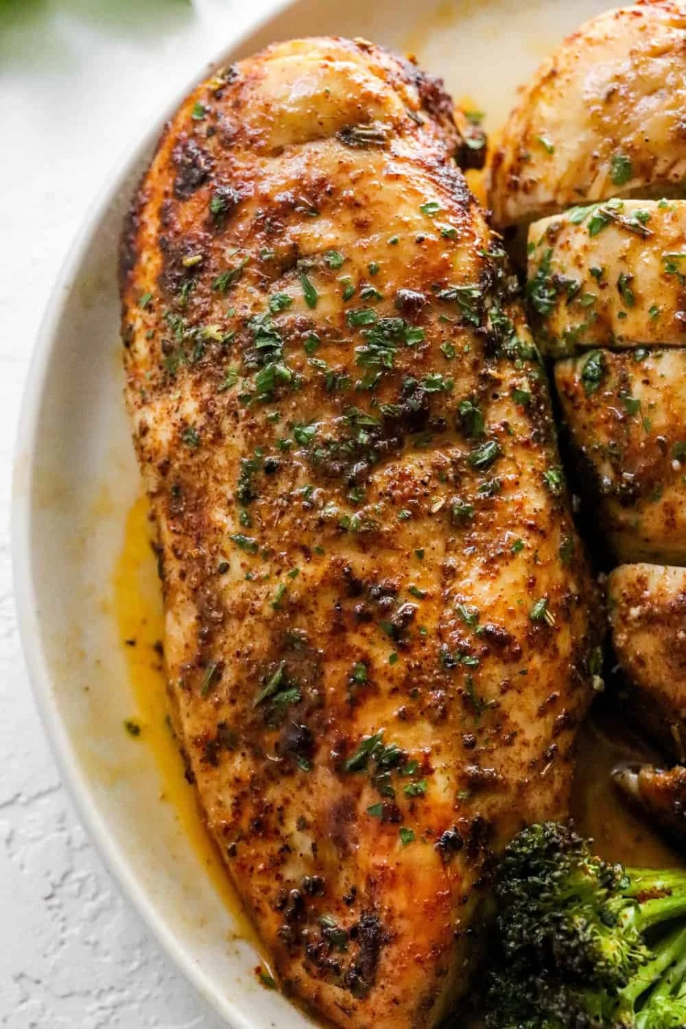 Juicy air fryer boneless chicken breast served on a plate