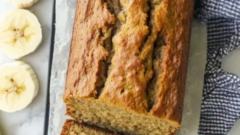 Moist and healthy banana bread slices on a wooden table