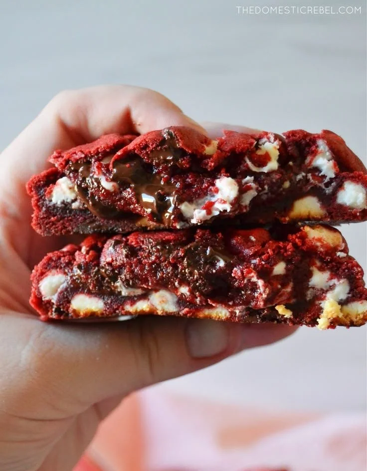 Delicious Red Velvet Cookies with cream cheese frosting on a plate.