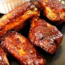Delicious slow cooker barbecue chicken wings ready to serve