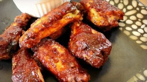 Delicious slow cooker barbecue chicken wings ready to serve