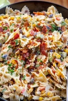 Colorful Southwest Pasta Salad with vegetables and dressing