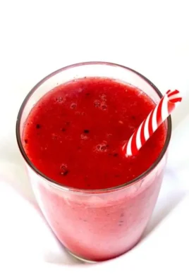 Delicious watermelon smoothie blended with fresh strawberries