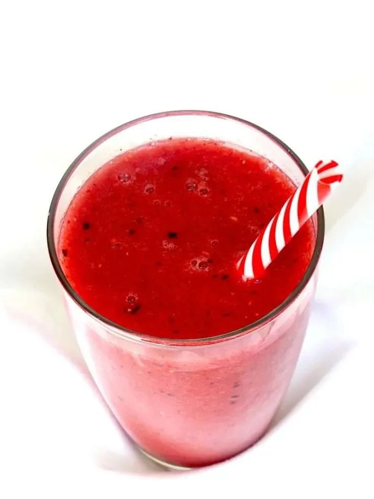 Delicious watermelon smoothie blended with fresh strawberries